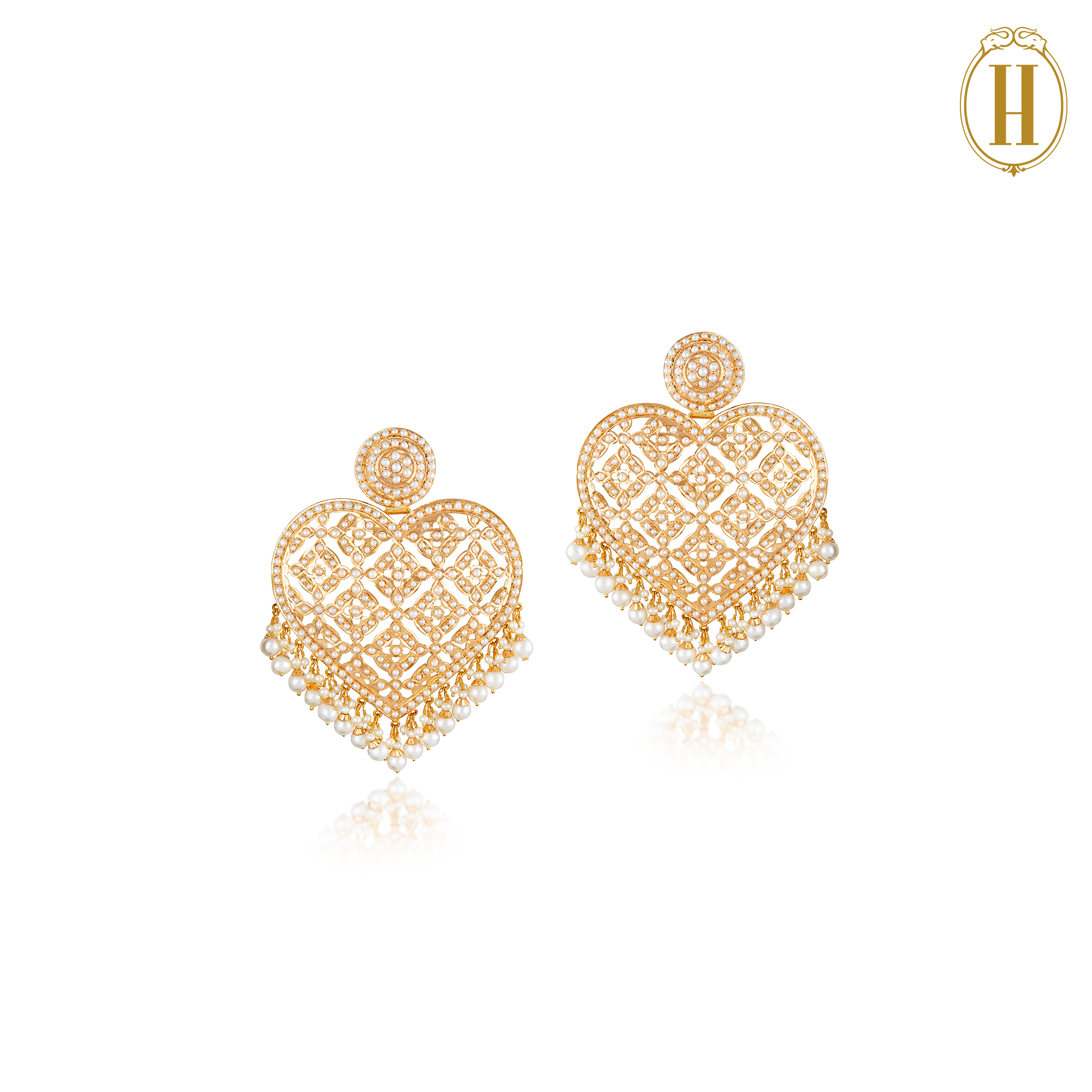 Gold heart shaped earring